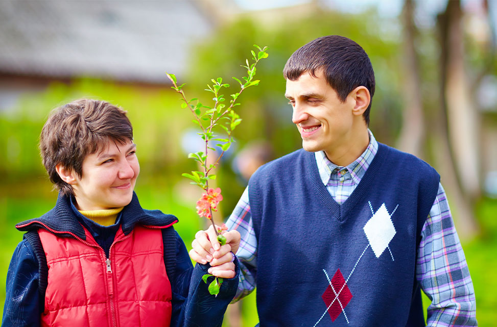 Photo of residents with flowers